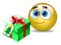Smiley opening Christmas gift emoticon (Christmas Emoticons)