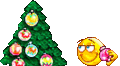 Decorating Xmas Tree emoticon (Christmas Emoticons)