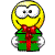 Smiley gives a present emoticon (Christmas Emoticons)