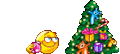 Smiley with Xmas Tree emoticon (Christmas Emoticons)